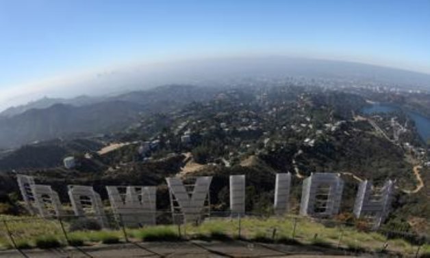 FILE PHOTO: Los Angeles is seen from behind the Hollywood sign in Los Angeles, California, U.S., August 14, 2019. REUTERS/Lucy Nicholson -/File Photo