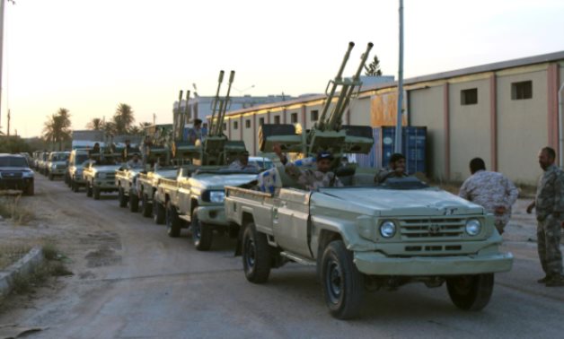 Military vehicles of members of the Libyan GNA forces head out from Misrata to the front line in Tripoli, Misrata, Libya May 10, 2019. REUTERS/Ayman Al-Sahili