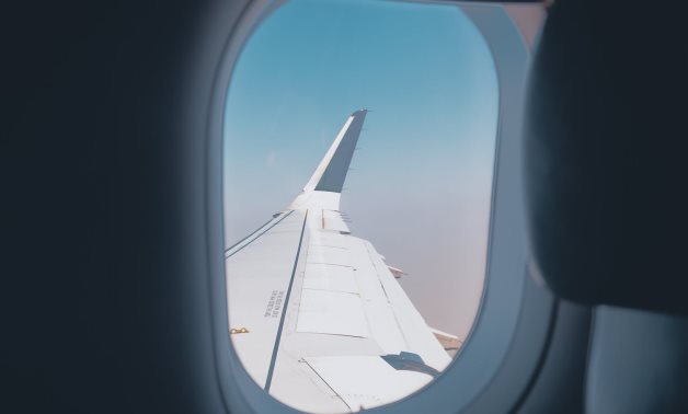 FILE – A plane wing seen from inside the plane – Sourav Mishra/Pexels