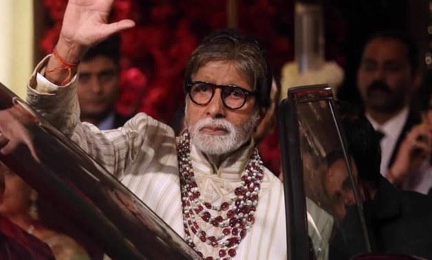 FILE PHOTO: Bollywood actor Amitabh Bachchan leaves after attending the wedding ceremony of Isha Ambani, the daughter of the Chairman of Reliance Industries Mukesh Ambani, in Mumbai, 