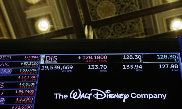 FILE PHOTO: The logo of the Walt Disney Company is displayed above the floor of the New York Stock Exchange shortly after the closing bell as the market takes a significant dip in New York, U.S.kson