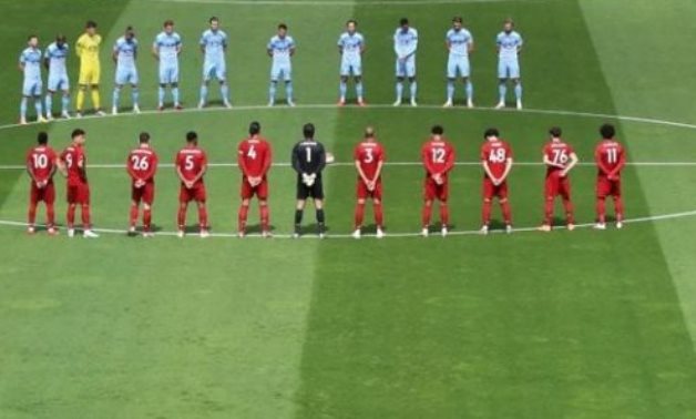 Players stand during a minutes silence in respect for the late Jack Charlton before the match,  via REUTERS/Phil Noble
