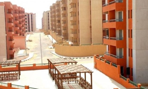 FILE - Asmarat alternative-housing project