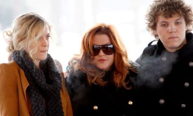 FILE PHOTO: Lisa Marie Presley, with her children Riley and Benjamin Keough, attend the 75th birthday celebration for Elvis Presley in Memphis, Tennessee January 8, 2010. REUTERS/Nikki Boertman/
