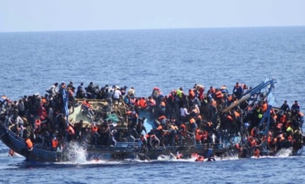 FILE- Overcrowded boat capsized off the coast of Libya in May, 2016 - Reuters