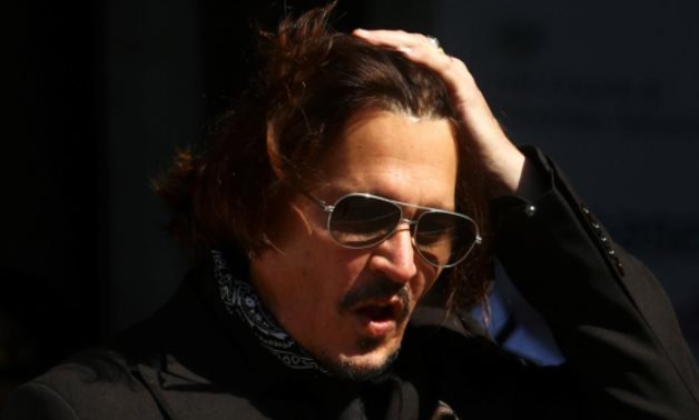 Actor Johnny Depp arrives at the High Court in London, Britain July 22, 2020. REUTERS/Hannah McKay