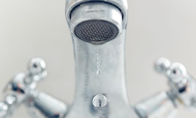   Photo of water dropped from gray stainless steel faucet- CC via Pikrepo