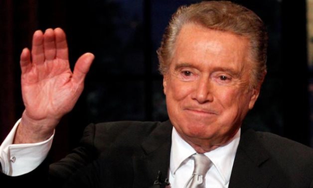 FILE PHOTO: Television host Regis Philbin waves goodbye during his final show of on ABC's "Live With Regis and Kelly" in New York, November 18, 2011. - REUTERS/Brendan McDermid/File Photo
