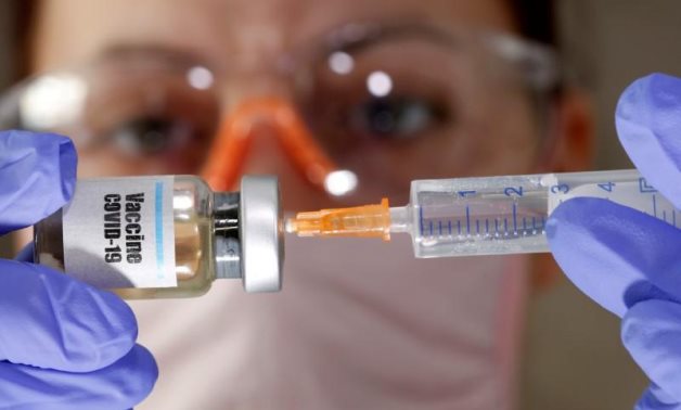 FILE – Small bottle labeled with coronavirus vaccine – Reuters