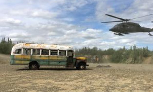 FILE PHOTO: An Alaska Army National Guard UH 60 Blackhawk helicopter hovers near "Bus 142", made famous by the "Into the Wild" .