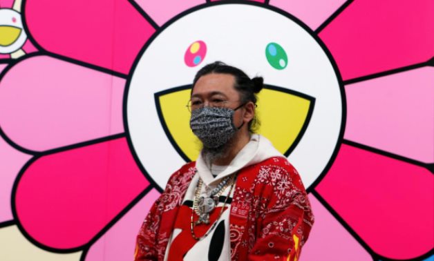 Japanese artist Takashi Murakami wearing a face mask speaks to reporters  in Tokyo, Japan, July 30, 2020. REUTERS/Chris Gallagher