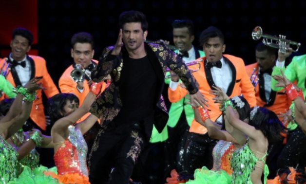 FILE PHOTO: Bollywood actor Sushant Singh Rajput (centre) performs at the International Indian Film Academy Awards in East Rutherford, New Jersey, U.S., July 15, 2017. REUTERS/Joe Penney
