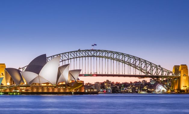 Jørn Utzon's Sydney Opera House, and the Harbour Bridge, two of Sydney's most famous landmarks, taken at dusk - CC via Flickr/ Benh LIEU SONG