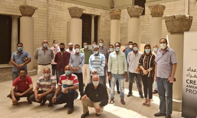 Staff of the Coptic Museum taking a group photo during the training workshop titled: "Tourism Ambassadors". - Photo Via Egypt's Min. of Culture