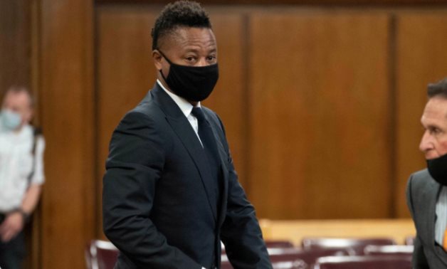 FILE PHOTO: Actor Cuba Gooding Jr. appears with his lawyer Marc Heller in New York Criminal Court in the Manhattan borough of New York City, New York,U.S., August 13, 2020. Steven Hirsch/Pool via REUTERS