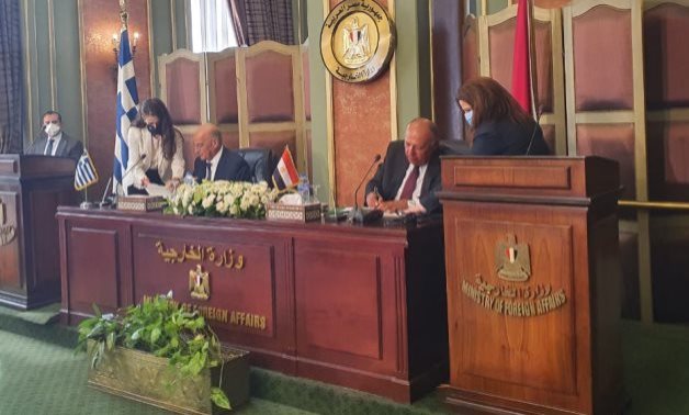FILE - Egyptian Foreign Minister Sameh Shoukry and his Greek counterpart, Nikos Dendias announced signing a maritime demarcation agreement, August 6, 2020 – Press photo