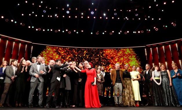  The awarded pose for a family picture after the awards ceremony at the 70th Berlinale International Film Festival in Berlin, REUTERS/Fabrizio Bensch/File Photo