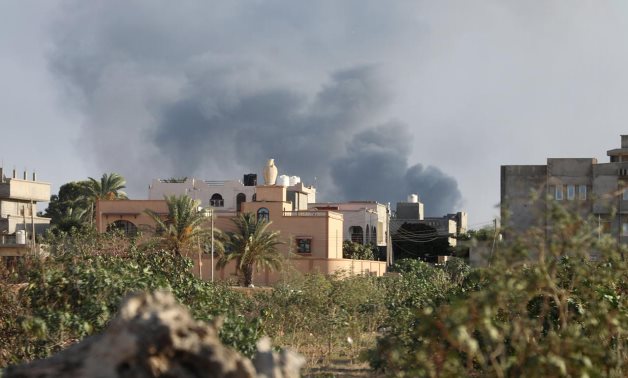 Smoke rises during heavy clashes between rival factions in Tripoli, Libya, August 28, 2018. Picture taken August 28, 2018. REUTERS/Hani Amara