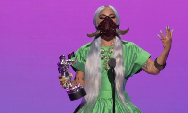 Lady Gaga accepts the award for Artist of the Year during the 2020 MTV VMAs in this screen grab image made available on August 30, 2020. VIACOM/Handout via REUTERS