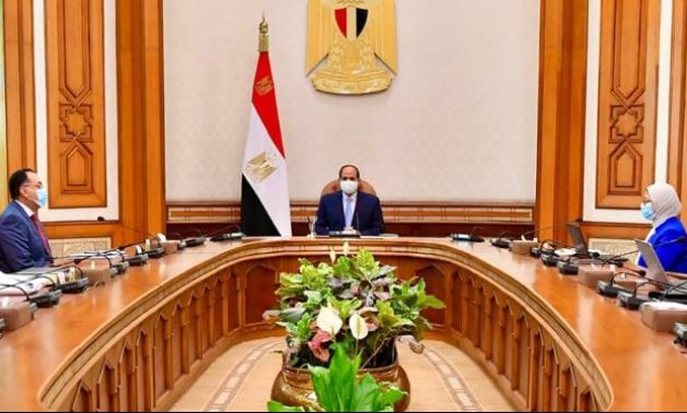 FILE – Egypt’s President Abdel Fattah El Sisi meets with Prime Minister Mustafa Madbouli and health officials – Press photo