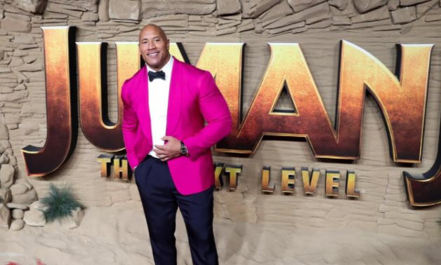 Actor Dwayne Johnson poses as he arrives to the premier of "Jumanji": The Next Level in London - Reuters/Yves Herman/File Photo