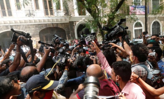 Media personnel surround Bollywood actor Rhea Chakraborty as she arrives at Narcotics Control Bureau (NCB) office for questioning, REUTERS/Francis Mascarenhas