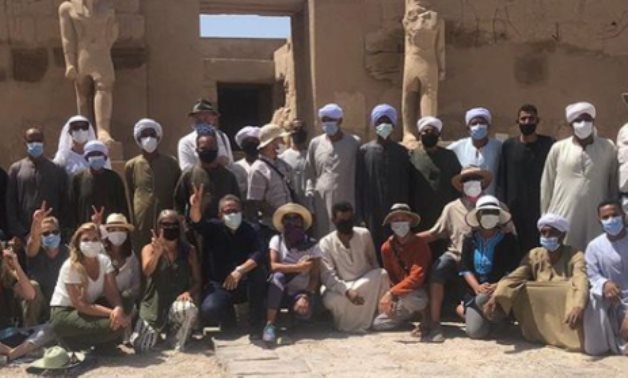 Minister of Antiquities Khaled el-Enany with tourists and Luxor locals - Instagram