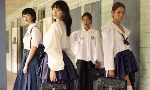Models pose for an advertising campaign wearing Thai designer Tin Tunsopon's creations aiming to be an alternative to the school uniforms that are mandatory in the country /Handout via REUTERS