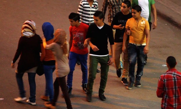 In this undated image made from video released by the producers of "Awel el Kheit" or "the Thread" which airs on the private TV station ONTV, a group of young men harass three girls in Cairo, Egypt.(Source: Reuters)