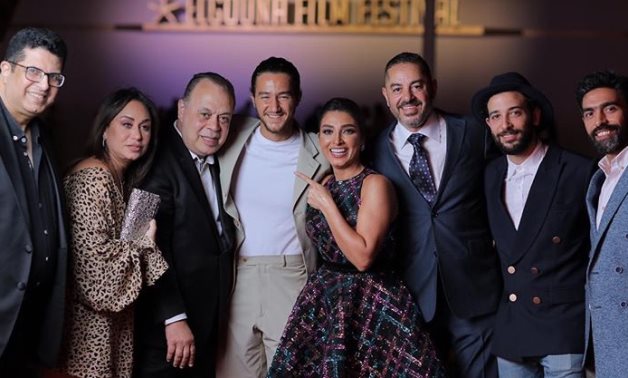 File: Ahmed Malek along with a notable group of stars.