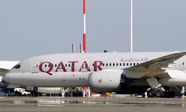 FILE: A Qatar Airways Boeing 787-8 Dreamliner airplane is pictured at Leonardo da Vinci-Fiumicino Airport in Rome, Italy, March 30, 2019. REUTERS/Alb