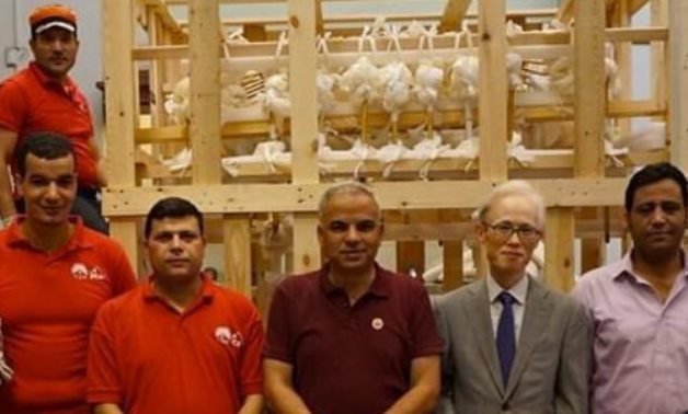Part of the awarded project team - photo via Egypt's Min. of Tourism & Antiquities