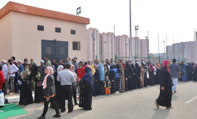 File- Long queues of voters outside a polling station in the city of Al Asmarat, Cairo, in the second phase of the 2020 House of Representatives election- Youm7 photo.