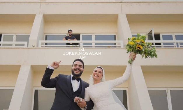 File- Salah's photo with the couple went viral on social media 