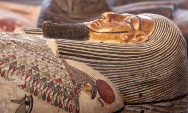 One of the delicately colored coffins unearthed recently in Saqqara Necropolis - photo via Egypt's Min. of Tourism & Antiquities