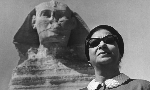 FILE - Umm Kulthum at the Sphinx in Giza
