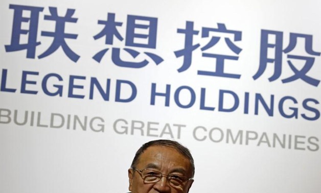Legend Holdings chairman Liu Chuanzhi attends a news conference on the company's annual results in Hong Kong, China March 30, 2016. REUTERS/Bobby Yip