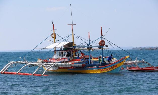 FILE - A fishing boat used to fish in the disputed Scarborough Shoal, in South China Sea is pictured in Masinloc, Zambales in the Philippines April 22, 2015 - Reuters