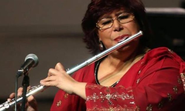 Egypt's Minister of Culture playing the flute - Press photo