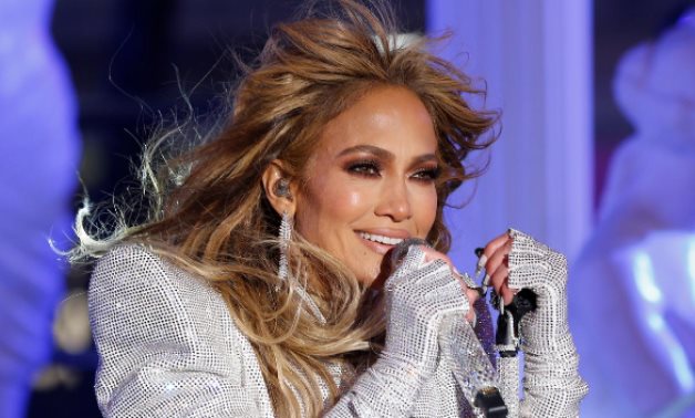 FILE PHOTO: Jennifer Lopez performs in Times Square on New Years Eve in New York City, U.S., December 31, 2020. Gary Hershorn/Pool via REUTERS