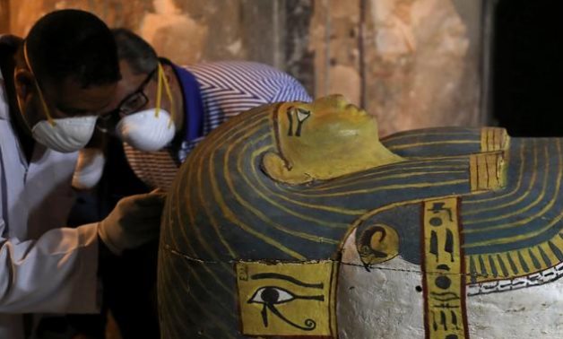 FILE - Egyptian sarcophagus opened - Reuters