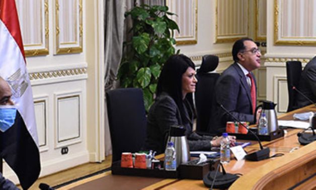 Prime Minister Mostafa Madbouly and International Cooperation Minister Rania al-Mashat during the video conference with EBRD officials Jan. 19, 2021 - Press photo