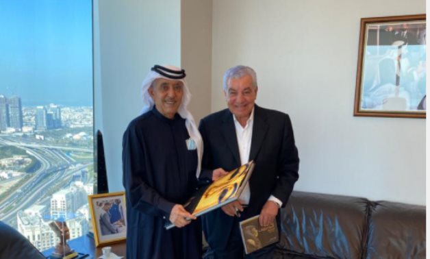 Hawass [R] with Sheikh Manea bin Rashid Al-Maktoum - ET