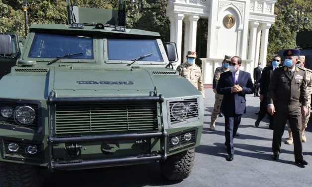 President Abdel Fatal al-Sisi with a sample of an armored vehicle that was developed by the Egyptian Armed Forces – Press Photo 
