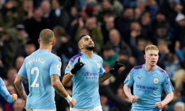Manchester City players celebrate scoring a goal, Reuters 