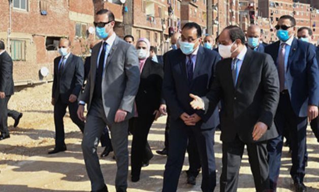 President Abdel Fattah El Sisi inspected on Sunday ongoing development work at the shanty area of Ezbet el Haggana and its surroundings in east Cairo.