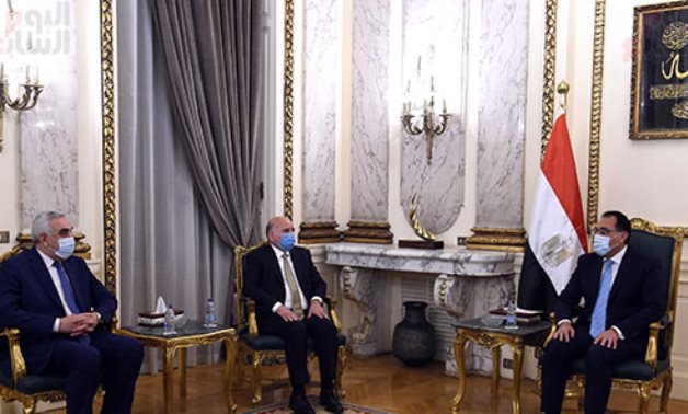 Prime Minister Mostafa Madbouli in a meeting with Iraqi Minister of Foreign Affairs Fouad Hussein in Cairo on February 8, 2021. Press Photo 