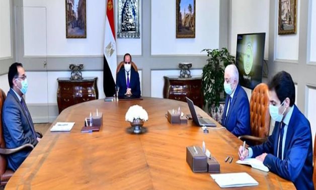 President Abdel Fatah al-Sisi in a meeting with Prime Minister Mostafa Madbouli and Minister of Education and Technical Education Tarek Shawky on February 14, 2021. Press Photo 