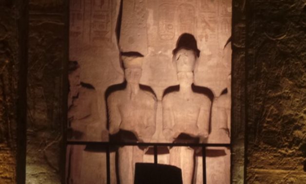 FILE- Sun illuminates four statues of King Ramses II seated at the top of Abu Simbel temple- Egypt TodayAbdullah Salah