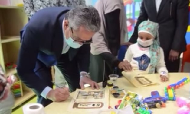 Khaled el-Enany, Egypt's tourism & antiquities minister visits children at Shifa El-Orman Hospital in Luxor - Scrteenshot from video